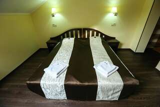 Отель Home Hotel Буковель Двухместный номер с 1 кроватью или 2 отдельными кроватями - Мансарда-10